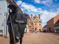 Pilgrim statue and western facade of Speyer Cathedral, Germany